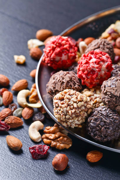 istock Homemade candy with chocolate , nuts and dried strawberry 641633450