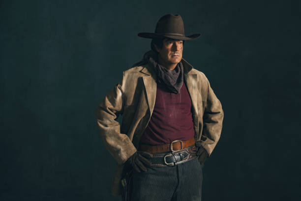 istock Retro late 1960s western actor. Studio portrait. 641635720