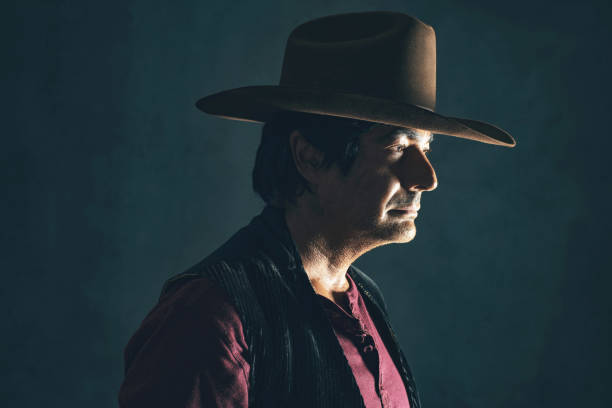 istock Profile shot of retro 1960s cowboy actor. 641635802