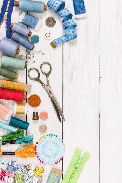 istock Old scissors, buttons, threads, measuring tape and sewing supplies 641637876
