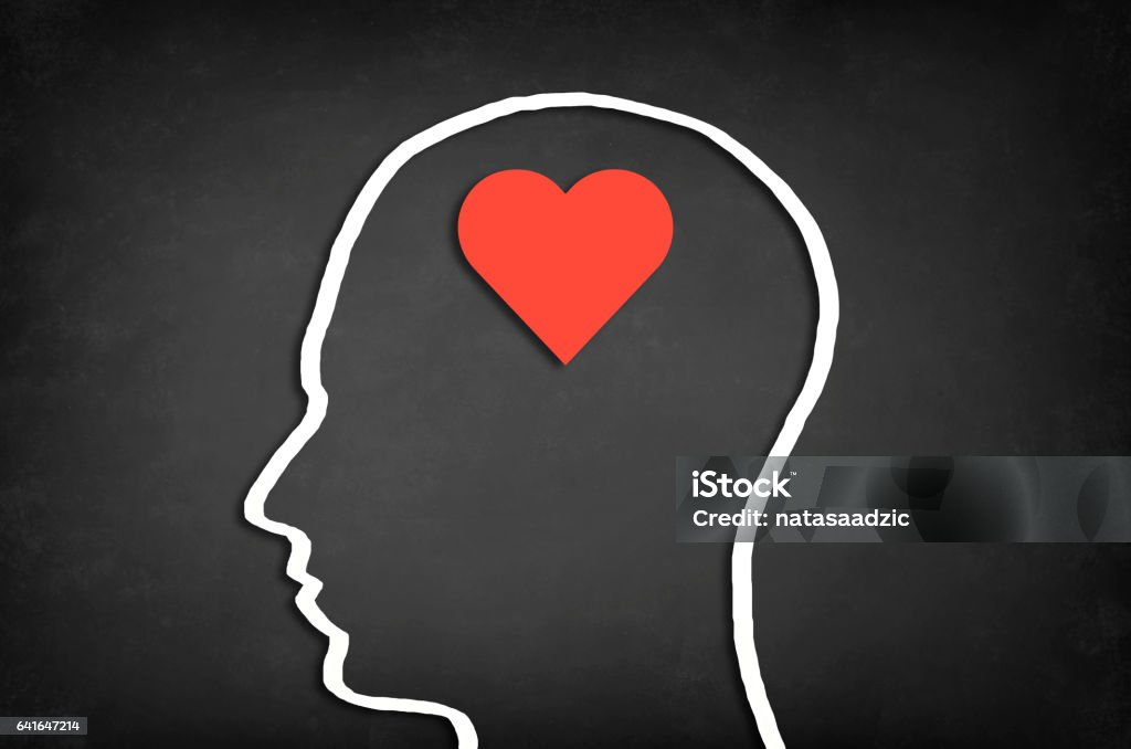 Concept of love. Heart shape in human head. Concept of love. Heart Shape Stock Photo