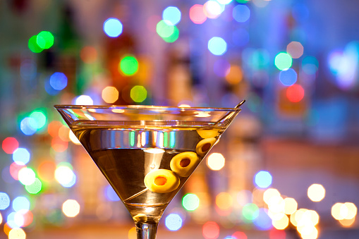 Glass of a martini coctail in a bar