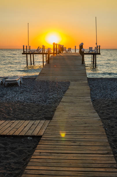 istock Wooden pier entering into the sea 641656338