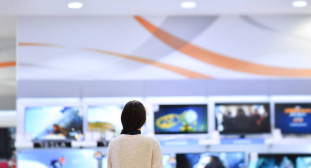 istock Woman buys the TV 641658040