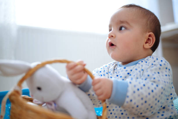 istock Baby playing with toys 641658250
