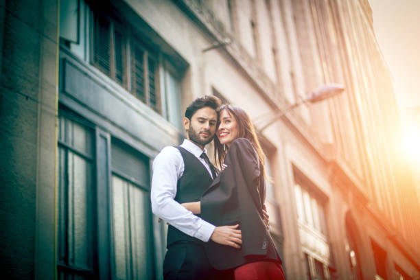 istock Couple hugging on the street 641661090
