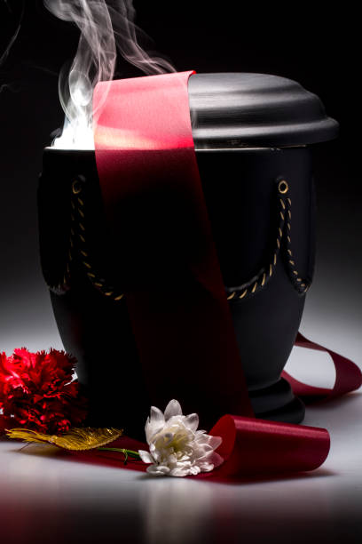 istock funeral mourning urn, for obituary 641661160