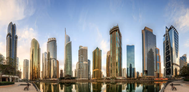 istock Panoramic view of Business bay and Lake Tower, reflection in a river, UAE 641661204