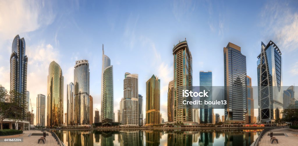 Panoramic view of Business bay and Lake Tower, reflection in a river, UAE Panoramic view of Business bay and Lake Tower, reflection in a river, Dubai, UAE. Jumeirah Stock Photo