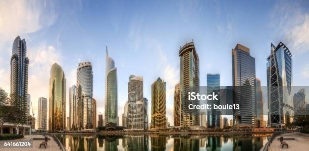 Panoramic View Of Business Bay And Lake Tower Reflection In A River Uae Stock Photo - Download Image Now