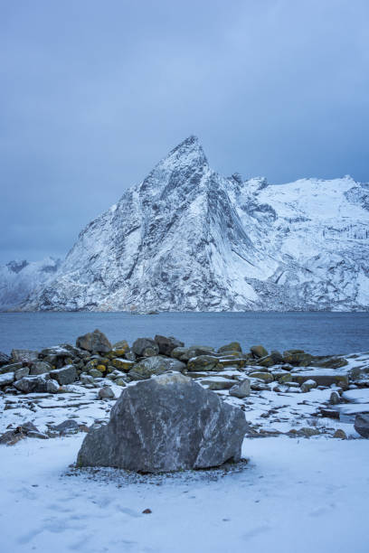 istock Winter mountains view with stones at foreground 641664524
