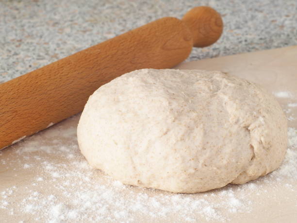 istock Cooking process. Preparing fresh dough for cakes, pastries, buns or pizza. 641666730