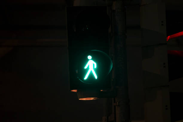 istock A green illuminated walk street pedestrian signal 641671212
