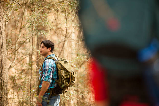 istock One Latin descent man enjoys nature on hiking trip. 641672354
