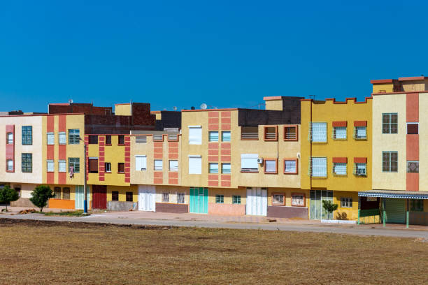 Row of colorful buildings. Neighborhood painted with pastel color. Modern architecture of suburban concept.