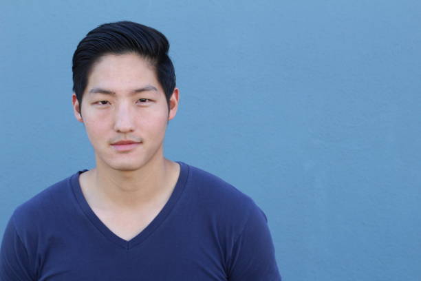 istock Attractive Asian man close up portrait 641675042