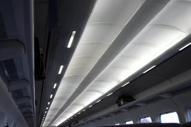 Row of lights overhead in Shinkansen.