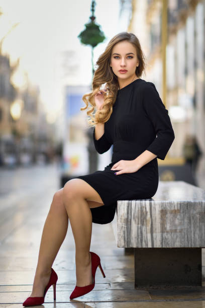 istock Blonde woman in urban background. 641678444
