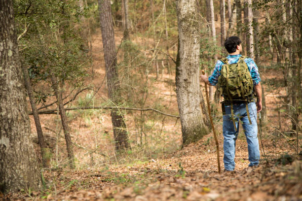 istock One man enjoys nature on hiking trip. 641678536