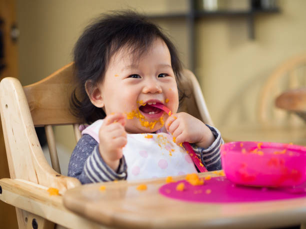 eating mess baby girl