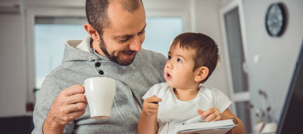 istock Father and son at home 641682164