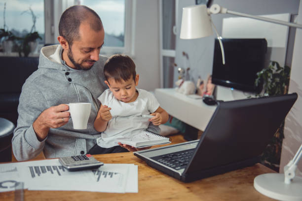istock Father and son at home 641682232