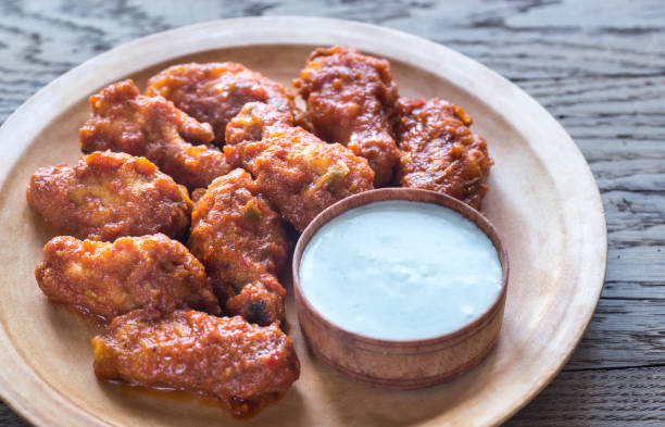istock Fried chicken wings with blue cheese sauce 641683132