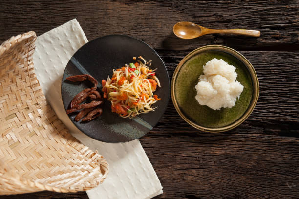 istock Papaya salad and earthen steamer 641685998