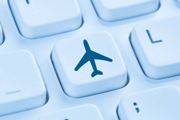 istock Booking flight holidays vacation online shopping e-commerce internet travel 641690396