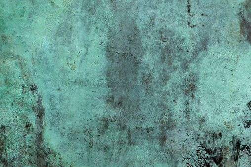 Oxidized green copper background.