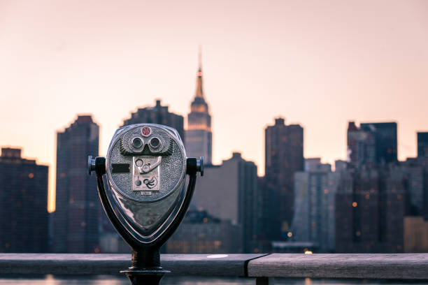 New York View A coin-operated viewfinder pointed towards midtown Manhattan and the Empire State Building view finder stock pictures, royalty-free photos & images