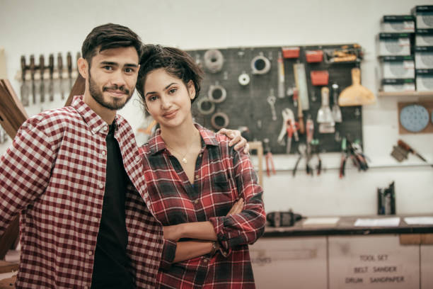 istock Couple at woodworking shop 641692454