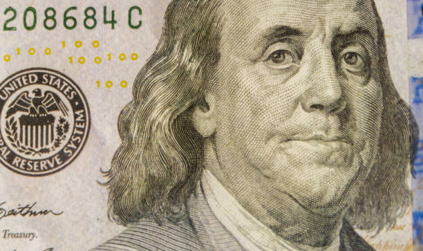 istock Benjamin Franklin on macro shot of a US 100 dollar 641694132