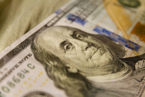 istock Benjamin Franklin on macro shot of a US 100 dollar 641694178