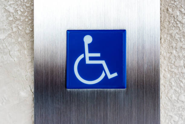 istock disabled person sign on metal plate 641694664