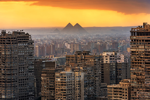 Landscape of Cairo,  with the Giza pyramids behind.