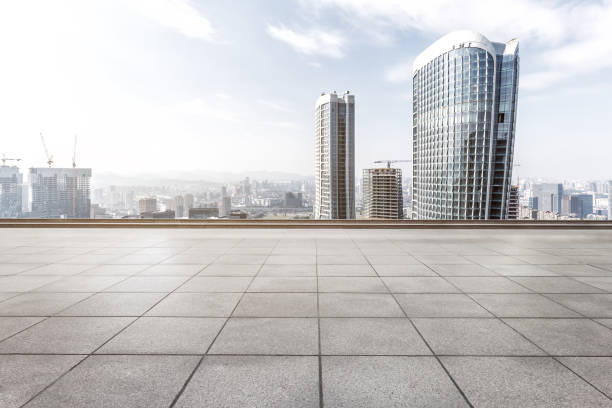 istock modern office buildings in hangzhou new city from empty brick floor 641698204