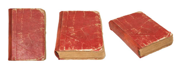 istock Old torn book isolated on white background. Vintage Book photographed from various angles. Tattered book 641700890