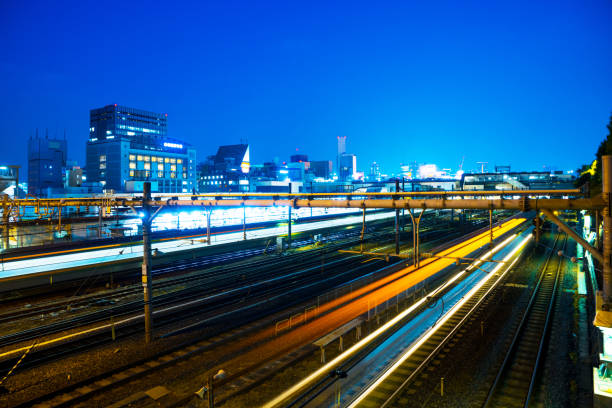 istock railroads in railway station at night 641705288