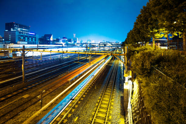 istock railroads in railway station at night 641706300