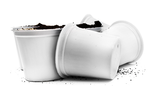 Spilled coffee cups on a white background.
