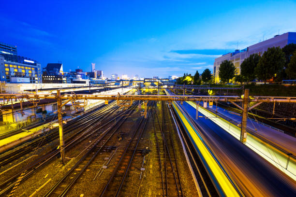 istock railroads in railway station at night 641708180