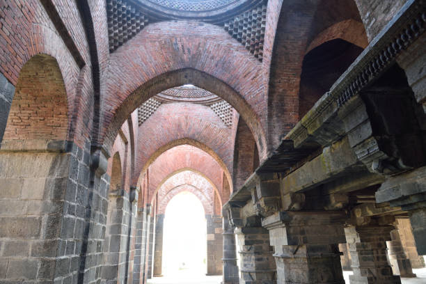 Ruins  Adina Mosque in Malda( Gaur) India The corridor inside the Adina Mosque. This mosque was built in 1373 by Sultan Sikandar Shah. Once considered as the largest mosque in Indian Subcontinent, the mosque has excellent terracotta works. gaur stock pictures, royalty-free photos & images