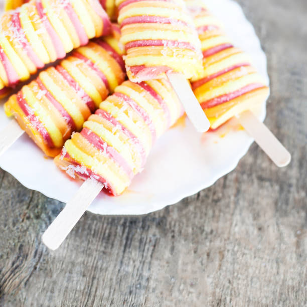 istock Fruit Ice cream sticks  on wooden table. Popsicles sorbet ice-cream with copyspace 641711414