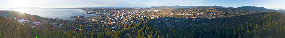 360 Aerial View of Bellingham, Washington State from Bay to Downtown Commercial District, Western Wa University, City and Forests