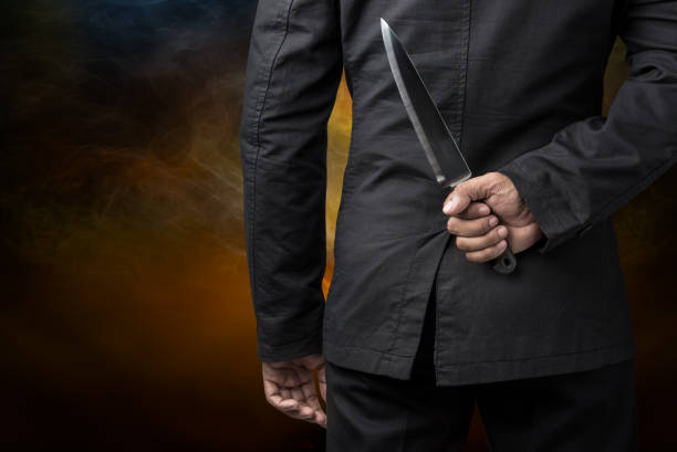 istock Businessman hold on knife 641711806
