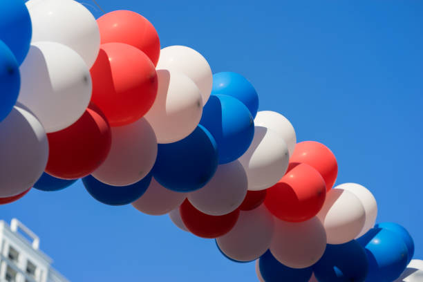 istock Colorful air balloons on blue sky background 641713032
