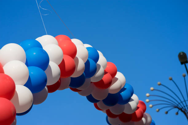 istock Colorful air balloons on blue sky background 641713134