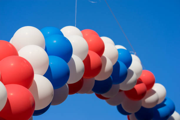 istock Colorful air balloons on blue sky background 641713152