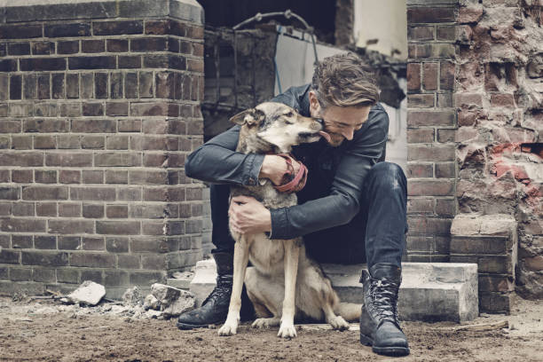 Casual man with dog on a building site